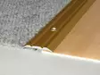 Saumalista alumiini / kulta / ruuvit 25 x 3,5 mm / 180 cm - Saumalistat - 6414675111840 - 3